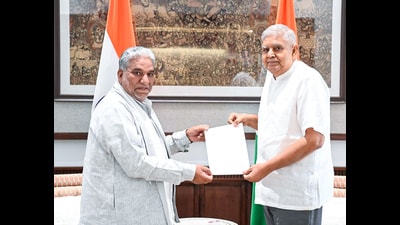 Vice-president and chairman, Rajya Sabha, Jagdeep Dhankhar, accepts the resignation of Krishan Lal Panwar, member of the council of states (Rajya Sabha) from Haryana in New Delhi on Monday. (ANI) Vice-president and chairman, Rajya Sabha, Jagdeep Dhankhar, accepts the resignation of Krishan Lal Panwar, member of the council of states (Rajya Sabha) from Haryana in New Delhi on Monday. (ANI)