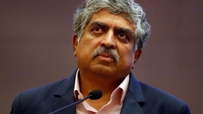 Nandan Nilekani shared how he met his wife at a 1977 quiz competition in Mumbai, highlighting their contrasting personalities. Both are involved in philanthropy, especially in environmental issues, and they joined the Giving Pledge to tackle increasing global inequality and the responsibilities of wealth. (Reuters) Nandan Nilekani shared how he met his wife at a 1977 quiz competition in Mumbai, highlighting their contrasting personalities. Both are involved in philanthropy, especially in environmental issues, and they joined the Giving Pledge to tackle increasing global inequality and the responsibilities of wealth. (Reuters)