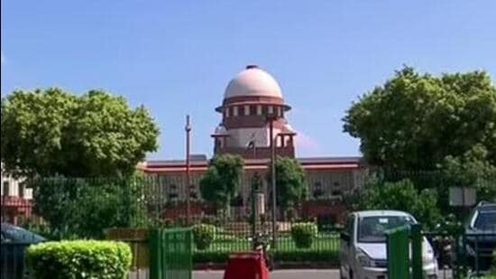 The bench pointed out that Khan was responsible for granting the land lease to a family trust in which he holds lifetime membership. (File photo)