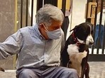 Ratan Tata with his office dog Goa in this photograph from 2020