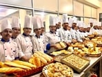 Students with the variety of bread on display