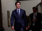 Canada's Prime Minister Justin Trudeau arrives to a press conference about the Royal Canadian Mounted Police's investigation into "violent criminal activity in Canada". 