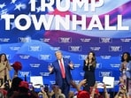 Donald Trump, with moderator and South Dakota Governor Kristi Noem (R), arrives for a town hall at the Greater Philadelphia Expo Center and Fairgrounds in Oaks, Pennsylvania, on October 14, 2024. (Photo by Jim WATSON / AFP) Donald Trump, with moderator and South Dakota Governor Kristi Noem (R), arrives for a town hall at the Greater Philadelphia Expo Center and Fairgrounds in Oaks, Pennsylvania, on October 14, 2024. (Photo by Jim WATSON / AFP)