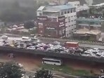 Many commuters who were travelling for work got stuck in the rain.