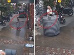 A woman had a close call when a water tank fell on her