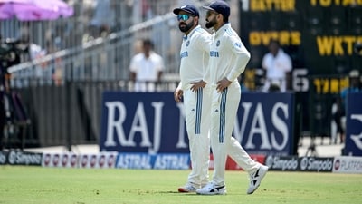 India's Virat Kohli (R) and captain Rohit Sharma arrive to field during the second day of the first Test cricket match between India and Bangladesh at the M.A. Chidambaram Stadium in Chennai on September 20, 2024 (AFP) India's Virat Kohli (R) and captain Rohit Sharma arrive to field during the second day of the first Test cricket match between India and Bangladesh at the M.A. Chidambaram Stadium in Chennai on September 20, 2024 (AFP)