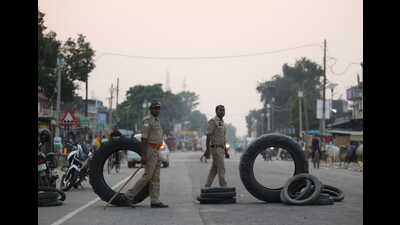 Cops barricade a road in Bahraich on Monday. (Deepak Gupta/HT) Cops barricade a road in Bahraich on Monday. (Deepak Gupta/HT)