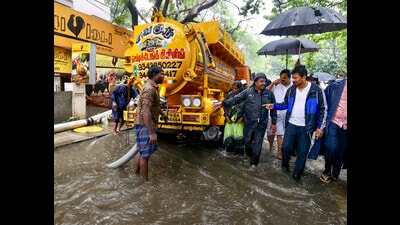 Tamil Nadu deputy chief minister Udhayanidhi Stalin inspects rain water removal works on VP Raman Road in Chennai on Tuesday. (PTI) Tamil Nadu deputy chief minister Udhayanidhi Stalin inspects rain water removal works on VP Raman Road in Chennai on Tuesday. (PTI)