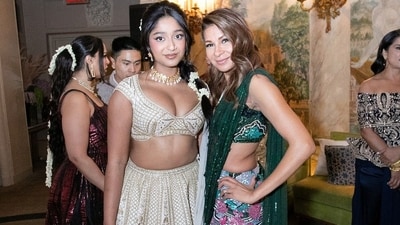Anjula Acharia, who is actor Priyanka Chopra's manager for the past many years, was seen with Maitreyi Ramakrishnan in a photo. The actor, who rose to prominence for her leading role as high school student Devi Vishwakumar in the Netflix teen comedy series Never Have I Ever, was dressed in a white and golden lehenga set. 