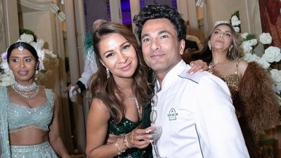 Chef Vikas Khanna also posed with host Anjula Acharia at her Diwali party. He was spotted in his white chef coat. 