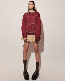 Ananya Panday opts for a burgundy colour oversized jumper and pleated micro mini skirt (Photo: Instagram) Ananya Panday opts for a burgundy colour oversized jumper and pleated micro mini skirt (Photo: Instagram)