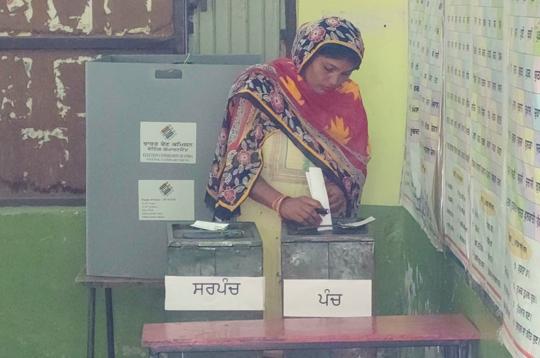 A woman casts her vote using the ballot box at the polling station at Bir Talab village on Tuesday. (Sanjeev Kumar/HT) A woman casts her vote using the ballot box at the polling station at Bir Talab village on Tuesday. (Sanjeev Kumar/HT)