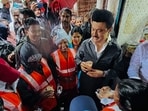 Tamil Nadu Chief Minister MK Stalin sipping tea with sanitation workers after inspecting the unhindered flow of rainwater in the Otteri Canal amid heavy rains, in Chennai on Tuesday.
Tamil Nadu Chief Minister MK Stalin sipping tea with sanitation workers after inspecting the unhindered flow of rainwater in the Otteri Canal amid heavy rains, in Chennai on Tuesday.