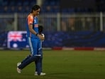 India's captain Harmanpreet Kaur walks off the field after losing to Australia during the ICC Women's T20 World Cup 2024 match at Sharjah Stadium