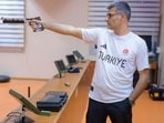 Silver medalist at the Paris 2024 Olympic Games, Turkish shooter Yusuf Dikec poses for a photograph in Ankara on August 9, 2024. (AFP)