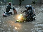 Bengaluru residents commute amid heavy rain. (Representational image) Bengaluru residents commute amid heavy rain. (Representational image)