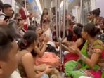 In the video, dozens of youngsters, dressed in dandiya outfits and ethnic attire, can be seen occupying an entire Metro coach In the video, dozens of youngsters, dressed in dandiya outfits and ethnic attire, can be seen occupying an entire Metro coach