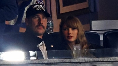 Oct 14, 2024; Bronx, New York, USA; Recording artist Taylor Swift and Kansas City Chiefs tight end Travis Kelce watch game one of the ALCS for the 2024 MLB Playoffs between the New York Yankees and the Cleveland Guardians at Yankee Stadium. Mandatory Credit: Vincent Carchietta-Imagn Images (USA TODAY Sports via Reuters Con)