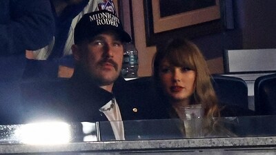 Taylor Swift and Kansas City Chiefs tight end Travis Kelce watch game one of the ALCS for the 2024 MLB Playoffs (USA TODAY Sports via Reuters Con)