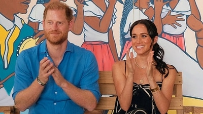 Meghan Markle and Prince Harry during their trip to Africa. (AFP) Meghan Markle and Prince Harry during their trip to Africa. (AFP)