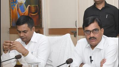 District magistrate Inder Vikram Singh (right) briefs the media the media about the poll arrangements on Wednesday. (Sakib Ali/HT Photo) District magistrate Inder Vikram Singh (right) briefs the media the media about the poll arrangements on Wednesday. (Sakib Ali/HT Photo)