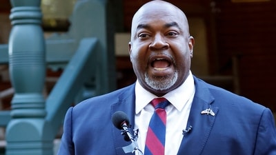 North Carolina Lt. Gov. Mark Robinson speaks at a news conference in Raleigh, N.C., Tuesday, Oct. 15, 2024. (AP Photo/Karl B DeBlaker) (AP) North Carolina Lt. Gov. Mark Robinson speaks at a news conference in Raleigh, N.C., Tuesday, Oct. 15, 2024. (AP Photo/Karl B DeBlaker) (AP)