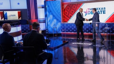 Rep. Colin Allred, D-Texas, top left, and Sen. Ted Cruz, R-Texas, greet each other at the beginning of a U.S. Senate debate, Tuesday, Oct. 15, 2024, in Dallas. (Shelby Tauber/Texas Tribune via AP, Pool) (AP) Rep. Colin Allred, D-Texas, top left, and Sen. Ted Cruz, R-Texas, greet each other at the beginning of a U.S. Senate debate, Tuesday, Oct. 15, 2024, in Dallas. (Shelby Tauber/Texas Tribune via AP, Pool) (AP)