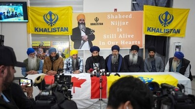 Guru Nanak Sikh Gurdwara Sahib spokesperson and youth leader, Gurkeerat Singh, back forth from left, speaks during a news conference, in Surrey, British Columbia, Tuesday, Oct. 15, 2024. (AP) Guru Nanak Sikh Gurdwara Sahib spokesperson and youth leader, Gurkeerat Singh, back forth from left, speaks during a news conference, in Surrey, British Columbia, Tuesday, Oct. 15, 2024. (AP)