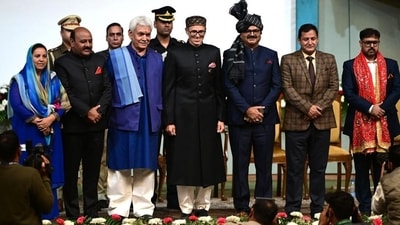 Jammu and Kashmir lieutenant governor Manoj Sinha with chief minister Omar Abdullah and other members of his cabinet at the swearing-in ceremony of the new J&K government in Srinagar on Wednesday. (Waseem Andrabi/HT) Jammu and Kashmir lieutenant governor Manoj Sinha with chief minister Omar Abdullah and other members of his cabinet at the swearing-in ceremony of the new J&K government in Srinagar on Wednesday. (Waseem Andrabi/HT)