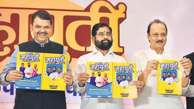 Mumbai, India. Oct 16, 2024: The Mahayuti government, led by Chief Minister Eknath Shinde, along with Deputy Chief Minister Devendra Fadnavis and Ajit Pawar, released its report card during a joint press conference in Mumbai. They showcased the development activities carried out by the government over the last two years. Mumbai, India. Cot, 16, 2024. (Photo by Raju Shinde/HT Photo) (Hindustan Times) Mumbai, India. Oct 16, 2024: The Mahayuti government, led by Chief Minister Eknath Shinde, along with Deputy Chief Minister Devendra Fadnavis and Ajit Pawar, released its report card during a joint press conference in Mumbai. They showcased the development activities carried out by the government over the last two years. Mumbai, India. Cot, 16, 2024. (Photo by Raju Shinde/HT Photo) (Hindustan Times)