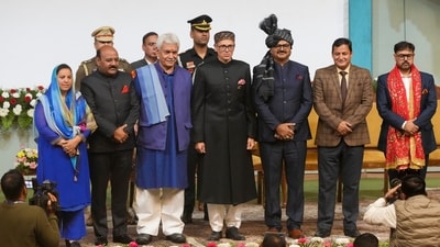 Jammu and Kashmir Lt. Governor Manoj Sinha, Chief Minister Omar Abdullah and other leaders at the swearing-in ceremony of new J&K government in Srinagar on Wednesday. (PTI) Jammu and Kashmir Lt. Governor Manoj Sinha, Chief Minister Omar Abdullah and other leaders at the swearing-in ceremony of new J&K government in Srinagar on Wednesday. (PTI)