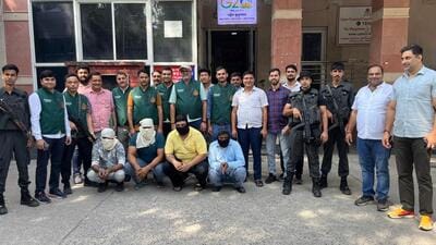 Police officials with four people held in the crackdown. (HT PHOTO) Police officials with four people held in the crackdown. (HT PHOTO)