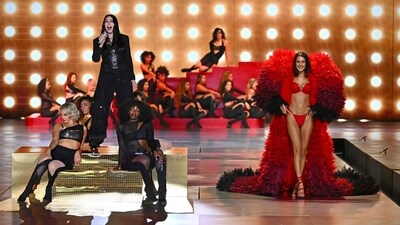 Singer Cher (Left) performs as model Bella Hadid (R) walks the runway. Like Gigi Hadid, Bella is a veteran of the Victoria’s Secret Fashion Show. The sisters took the stage on Tuesday's 2024 Victoria's Secret Fashion Show. Bella’s appearance was a surprise, as she was not announced as part of the cast and has stepped back from modelling recently. She appeared in a red bra set and giant matching wings. (AFP) Singer Cher (Left) performs as model Bella Hadid (R) walks the runway. Like Gigi Hadid, Bella is a veteran of the Victoria’s Secret Fashion Show. The sisters took the stage on Tuesday's 2024 Victoria's Secret Fashion Show. Bella’s appearance was a surprise, as she was not announced as part of the cast and has stepped back from modelling recently. She appeared in a red bra set and giant matching wings. (AFP)