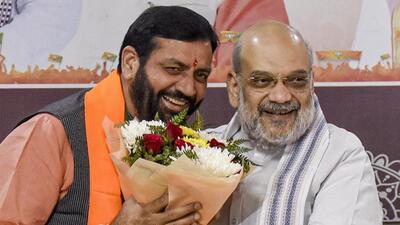 Union home minister Amit Shah greeting Nayab Singh Saini after he was unanimously elected as the Haryana BJP’s legislature party leader in Panchkula on Wednesday. (PTI Photo) Union home minister Amit Shah greeting Nayab Singh Saini after he was unanimously elected as the Haryana BJP’s legislature party leader in Panchkula on Wednesday. (PTI Photo)