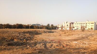 Vacant plots in Narela, where an array of transport and civic infrastructure projects are set to come up. (HT Archive) Vacant plots in Narela, where an array of transport and civic infrastructure projects are set to come up. (HT Archive)