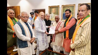 While Union Home minister Amit Shah, who is flying back to Chandigarh again late Wednesday night, and party functionaries are likely to finalise the names of the MLAs to be inducted into the Council of Ministers later tonight, party functionaries said that it is expected that 10 MLAs besides, Nayab Saini will be inducted in the Council of Ministers. (PTI) While Union Home minister Amit Shah, who is flying back to Chandigarh again late Wednesday night, and party functionaries are likely to finalise the names of the MLAs to be inducted into the Council of Ministers later tonight, party functionaries said that it is expected that 10 MLAs besides, Nayab Saini will be inducted in the Council of Ministers. (PTI)