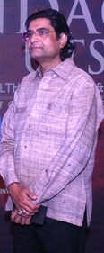 Curator Kamal Amrohvi