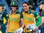 South Africa's Anneke Bosch (L) and Chloe Tryon celebrate their win at the end of the ICC Women's T20 World Cup cricket semi-final match against Australia South Africa's Anneke Bosch (L) and Chloe Tryon celebrate their win at the end of the ICC Women's T20 World Cup cricket semi-final match against Australia
