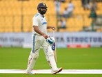 India's captain Rohit Sharma reacts as he walks off the field after losing his wicket. India's captain Rohit Sharma reacts as he walks off the field after losing his wicket.