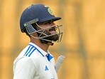 India's Virat Kohli reacts as he walks off the field after losing his wicket during the day two of the first cricket test match between India and New Zealand at the M.Chinnaswamy Stadium, India's Virat Kohli reacts as he walks off the field after losing his wicket during the day two of the first cricket test match between India and New Zealand at the M.Chinnaswamy Stadium,