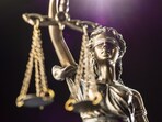 Lady Justice is usually represented as blindfolded and holding a set of scales