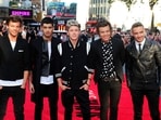 Louis Tomlinson, from left, Zayn Malik, Niall Horan, Harry Styles and Liam Payne arrive for the World Premiere of "One Direction: This Is Us," at the Empire Leicester Square, in London, Aug. 20, 2013. 