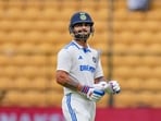 India's Virat Kohli walks off the ground after being clean bowled during the second day of the first Test cricket match against New Zealand, at M Chinnaswamy Stadium, in Bengaluru India's Virat Kohli walks off the ground after being clean bowled during the second day of the first Test cricket match against New Zealand, at M Chinnaswamy Stadium, in Bengaluru