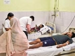 People being treated after the consumption of suspected spurious liquor, in Saran, (PTI Photo) 