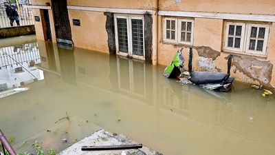 View of a partially submerged house following heavy rainfall, in Bengaluru on Wednesday. (ANI Photos) (Savitha) View of a partially submerged house following heavy rainfall, in Bengaluru on Wednesday. (ANI Photos) (Savitha)