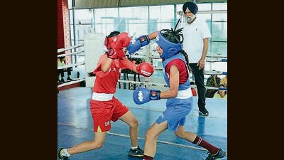 Boxing players during a practice session at a boxing academy at Chakar in Jagraon, Ludhiana, on Thursday. (HT Photo) Boxing players during a practice session at a boxing academy at Chakar in Jagraon, Ludhiana, on Thursday. (HT Photo)