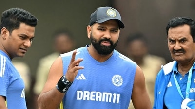 India's captain Rohit Sharma (C) inspects the field after the first day play of the first Test cricket match between India and New Zealand was called-off due to rain (AFP) India's captain Rohit Sharma (C) inspects the field after the first day play of the first Test cricket match between India and New Zealand was called-off due to rain (AFP)