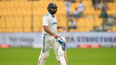 India's captain Rohit Sharma reacts as he walks off the field after losing his wicket. (AP) India's captain Rohit Sharma reacts as he walks off the field after losing his wicket. (AP)