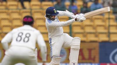 Jasprit Bumrah plays a shot on the second day of the first match between India and New Zealand, at the M Chinnaswamy Stadium, in Bengaluru, on Thursday. (PTI) Jasprit Bumrah plays a shot on the second day of the first match between India and New Zealand, at the M Chinnaswamy Stadium, in Bengaluru, on Thursday. (PTI)