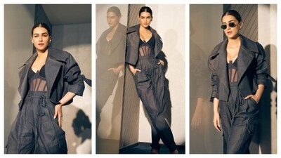 Kriti Sanon rocked a confident, contemporary look. She wore a dark co-ord set, wearing a jacket, a sheer top, and loose-fitting, high-waisted pants. The top underneath added a sultry feminine touch to the otherwise androgynous outfit.&nbsp; (Instagram/@sukritigrover)